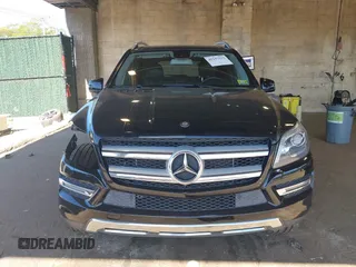 2014 Mercedes-Benz GL 450 z VIN 4JGDF7CE7EA395551, wystawiony jako IAAI lot #42247332 z przebiegiem 105 636 mil mil oraz . Historia ofert i sprzedaży dostępna na DreamBid. Obrazek 13.