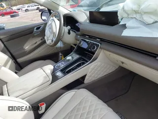 2023 Genesis GV80 z VIN KMUHCESC2PU127234, wystawiony jako IAAI lot #42076050 z przebiegiem 24 281 mil mil oraz . Historia ofert i sprzedaży dostępna na DreamBid. Obrazek 5.