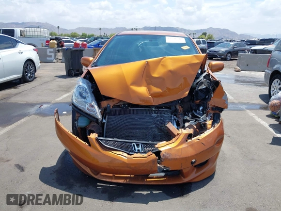 2009 Honda Fit Sport z VIN JHMGE88459S053122, wystawiony jako IAAI lot #42195267 z przebiegiem 47 349 mil mil oraz . Historia ofert i sprzedaży dostępna na DreamBid. Obrazek 12.