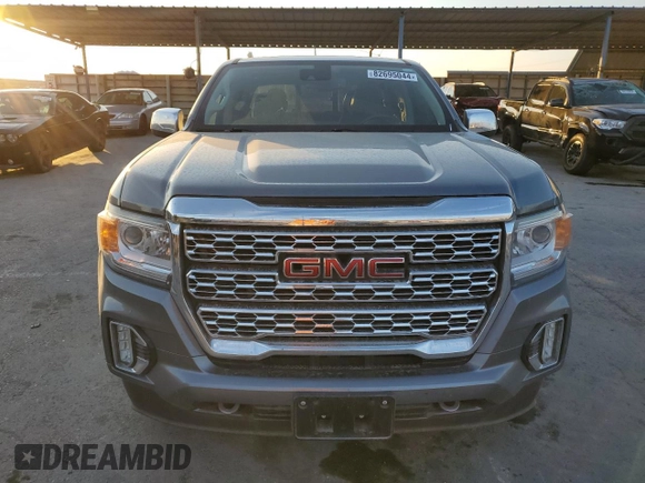 2021 GMC Canyon 4WD Denali with VIN 1GTG6EEN4M1130779, listed as a Copart auction lot 82695044 with 38,662 mi miles and Salvage Title. Bid and sale history available at carsss.com. Image 5.