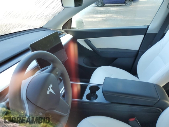 2022 Tesla Model Y Performance with VIN 7SAYGDEF3NF516349, listed as a Copart auction lot 63759245 with Not provided miles and Salvage title. Bid and sale history available at DreamBid. Image 9.