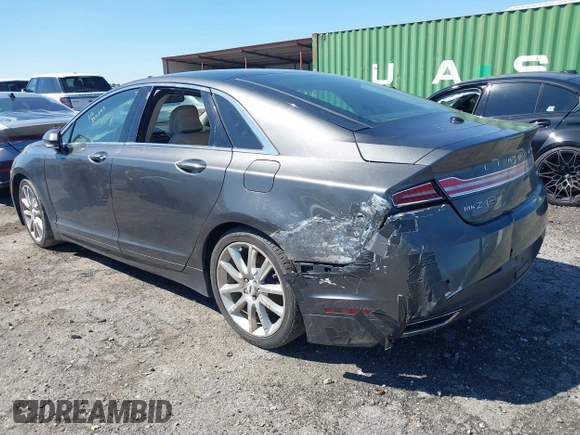 2016 Lincoln MKZ z VIN 3LN6L2G90GR632116, wystawiony jako IAAI lot #41836442 z przebiegiem 121 223 mil mil oraz . Historia ofert i sprzedaży dostępna na DreamBid. Obrazek 3.