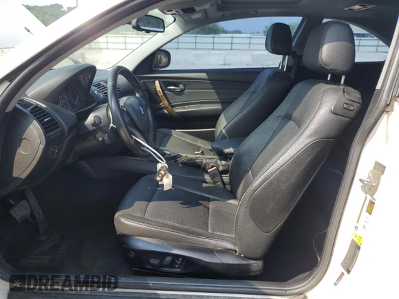2011 BMW 1 Series 128i with VIN WBAUP9C55BVL89682, listed as a Copart auction lot 59177385 with 131,327 mi miles and Salvage title. Bid and sale history available at DreamBid. Image 7.