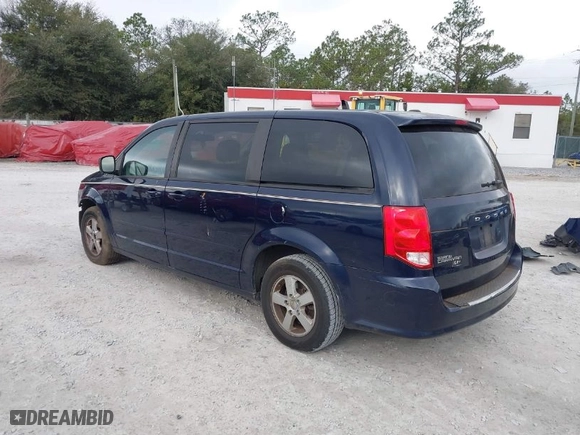 2012 Dodge Grand Caravan SE with VIN 2C4RDGBG3CR328103, listed as a IAAI auction lot 41463648 with 115,186 mi miles. Bid and sale history available at carsss.com. Image 3.
