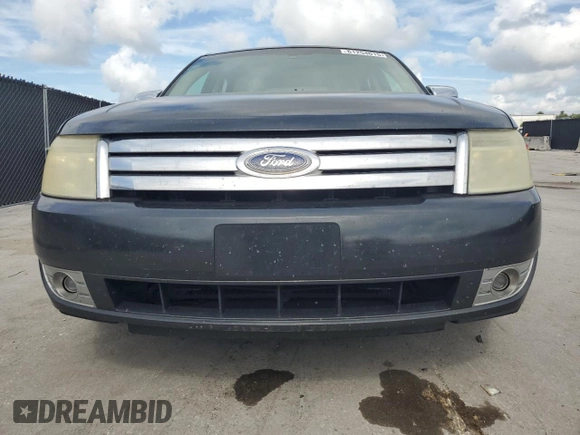 2008 Ford Taurus Limited with VIN 1FAHP25W78G128851, listed as a Copart auction lot 61254015 with 216,335 mi miles and Salvage title. Bid and sale history available at DreamBid. Image 5.