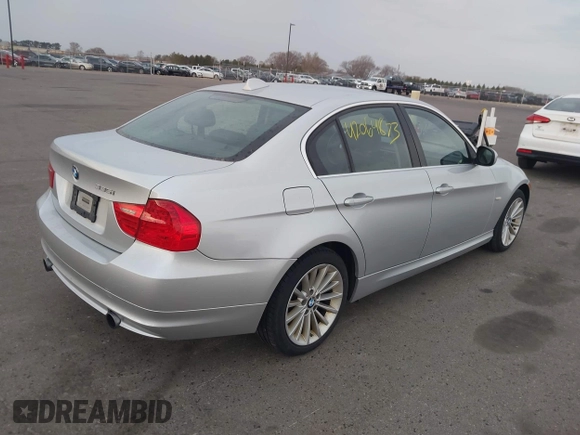 2010 BMW 3 Series 335i xDrive with VIN WBAPL3C57AA408986, listed as a IAAI auction lot 42064873 with 111,699 mi miles and . Bid and sale history available at DreamBid. Image 4.
