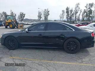 2013 Audi S8 with VIN WAUD2AFD0DN028673, listed as a IAAI auction lot 41689320 with 115,502 mi miles. Bid and sale history available at carsss.com. Image 14.