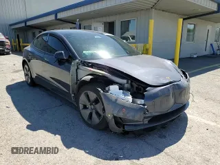 2023 Tesla Model 3 z VIN 5YJ3E1EAXPF409835, wystawiony jako Copart lot #56205335 z przebiegiem Nie podano mil oraz Szkoda całkowita • Salvage title. Historia ofert i sprzedaży dostępna na DreamBid. Obrazek 13.