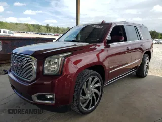 2016 GMC Yukon Denali with VIN 1GKS1CKJ9GR246441, listed as a Copart auction lot 51876925 with 158,323 mi miles and Salvage Title. Bid and sale history available at DreamBid. Image 1.