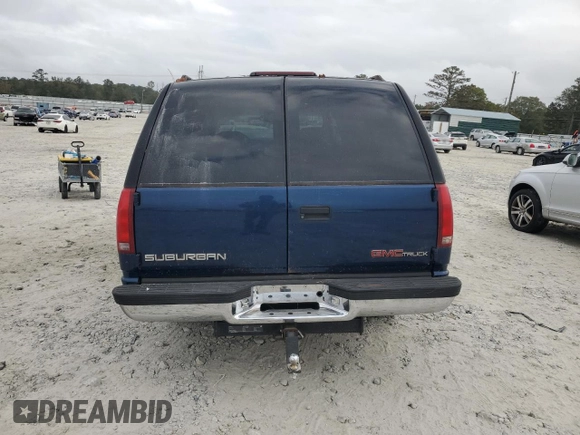 1997 GMC Suburban with VIN 3GKFK16R4VG519902, listed as a Copart auction lot 79031204 with 195,624 mi miles and Salvage Title. Bid and sale history available at DreamBid. Image 6.
