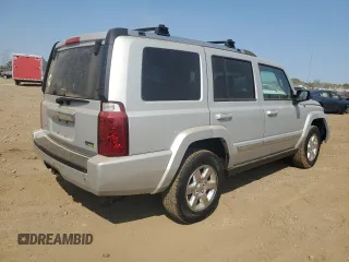 2007 Jeep Commander Limited with VIN 1J8HG58P87C595890, listed as a Copart auction lot 71123654 with 148,438 mi miles and Salvage Title. Bid and sale history available at carsss.com. Image 3.
