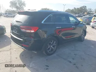 2016 Kia Sorento SX with VIN 5XYPK4A57GG023001, listed as a IAAI auction lot 41154189 with 93,399 mi miles. Bid and sale history available at carsss.com. Image 4.