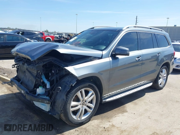 2018 Mercedes-Benz GLS 450 z VIN 4JGDF6EE3JB079513, wystawiony jako IAAI lot #41725648 z przebiegiem 60 590 mil mil oraz . Historia ofert i sprzedaży dostępna na DreamBid. Obrazek 21.