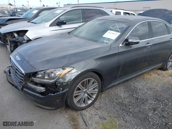 2018 Genesis G80 3.8L with VIN KMHGN4JE7JU262623, listed as a IAAI auction lot 41230215 with 94,006 mi miles. Bid and sale history available at carsss.com. Image 2.
