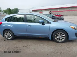 2012 Subaru Impreza Premium with VIN JF1GPAB64CH238673, listed as a IAAI auction lot 42548253 with 147,734 mi miles and . Bid and sale history available at DreamBid. Image 14.