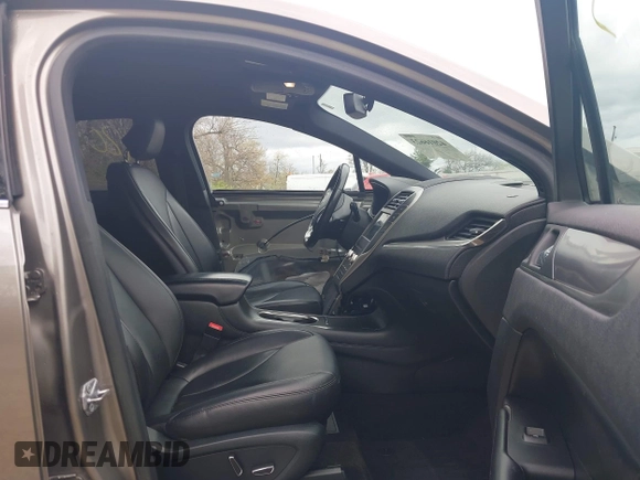 2017 Lincoln MKC Premiere with VIN 5LMCJ1C93HUL27435, listed as a IAAI auction lot 42016623 with 77,701 mi miles and . Bid and sale history available at DreamBid. Image 5.