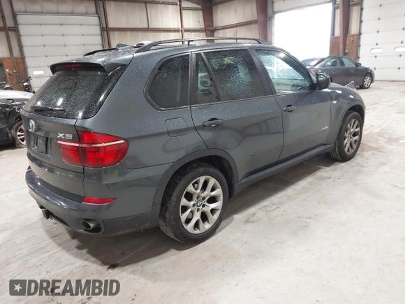 2012 BMW X5 35i z VIN 5UXZV4C59CL985715, wystawiony jako IAAI lot #42307586 z przebiegiem 105 147 mil mil oraz . Historia ofert i sprzedaży dostępna na DreamBid. Obrazek 4.