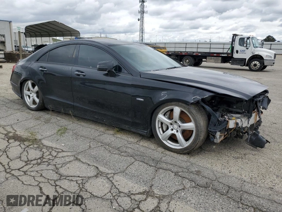 2012 Mercedes-Benz CLS 550 with VIN WDDLJ7DB8CA039888, listed as a Copart auction lot 50652995 with 167,075 mi miles and Salvage title. Bid and sale history available at DreamBid. Image 4.