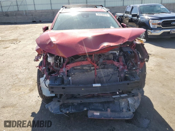 2022 Toyota Corolla Cross LE with VIN 7MUCAABG8NV008867, listed as a Copart auction lot 57232415 with 48,670 mi miles and Salvage title. Bid and sale history available at DreamBid. Image 5.