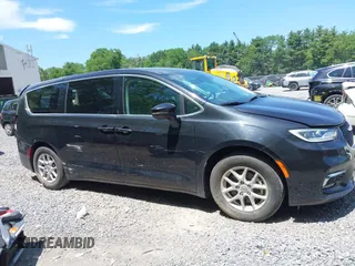 2023 Chrysler Pacifica Touring L with VIN 2C4RC1BG2PR534194, listed as a IAAI auction lot 42613934 with 69,896 mi miles and . Bid and sale history available at DreamBid. Image 13.