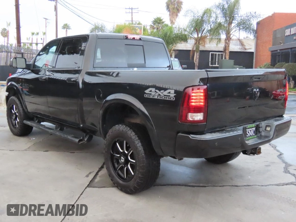 2017 Ram 2500 Laramie with VIN 3C6UR5FL9HG540564, listed as a Copart auction lot 87456764 with 140,470 mi miles and Salvage Title. Bid and sale history available at carsss.com. Image 4.