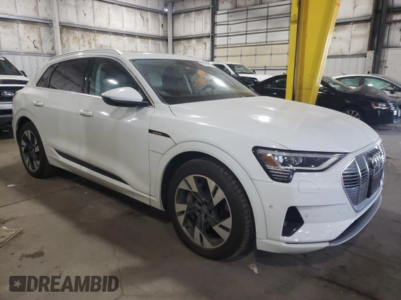 2021 Audi e-tron Prestige with VIN WA1VABGEXMB001869, listed as a Copart auction lot 52728573 with 26,110 mi miles and . Bid and sale history available at DreamBid. Image 4.