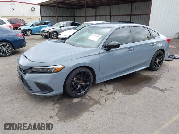2022 Honda Civic Sport z VIN 2HGFE2F58NH569211, wystawiony jako IAAI lot #41784870 z przebiegiem 22 255 mil mil oraz . Historia ofert i sprzedaży dostępna na DreamBid. Obrazek 17.