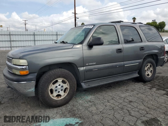 2002 Chevrolet Tahoe LS with VIN 1GNEC13T22R268336, listed as a Copart auction lot 50947675 with 238,425 mi miles and Salvage title. Bid and sale history available at DreamBid. Image 1.