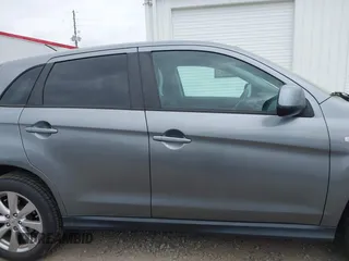 2015 Mitsubishi Outlander Sport ES with VIN 4A4AP3AU5FE062047, listed as a IAAI auction lot 41920635 with 107,880 mi miles. Bid and sale history available at carsss.com. Image 14.