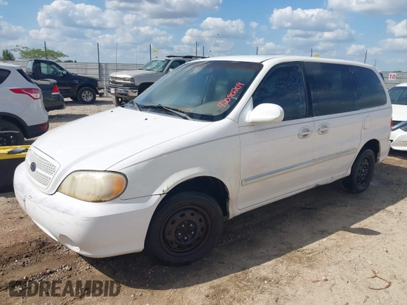 2005 Kia Sedona LX with VIN KNDUP131456634276, listed as a IAAI auction lot 42090209 with 185,754 mi miles and . Bid and sale history available at DreamBid. Image 2.