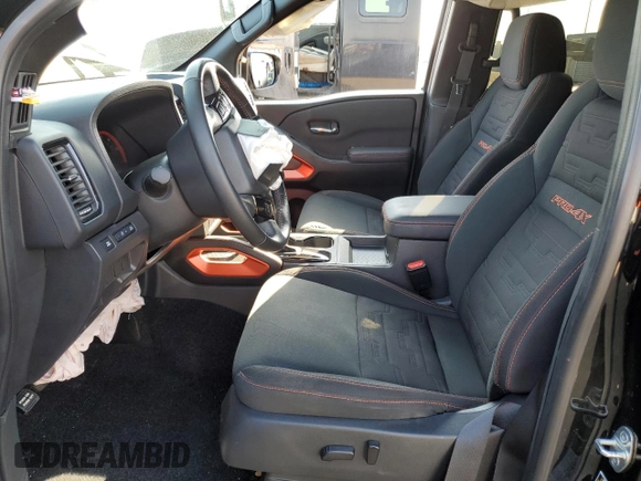 2023 Nissan Frontier Pro-4X with VIN 1N6ED1EK9PN653818, listed as a Copart auction lot 50932735 with 55,466 mi miles and Salvage title. Bid and sale history available at DreamBid. Image 7.