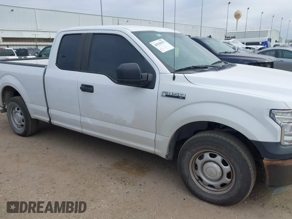 2015 Ford F-150 XL with VIN 1FTEX1CF9FKE89616, listed as a IAAI auction lot 41535973 with 212,364 mi miles. Bid and sale history available at carsss.com. Image 13.