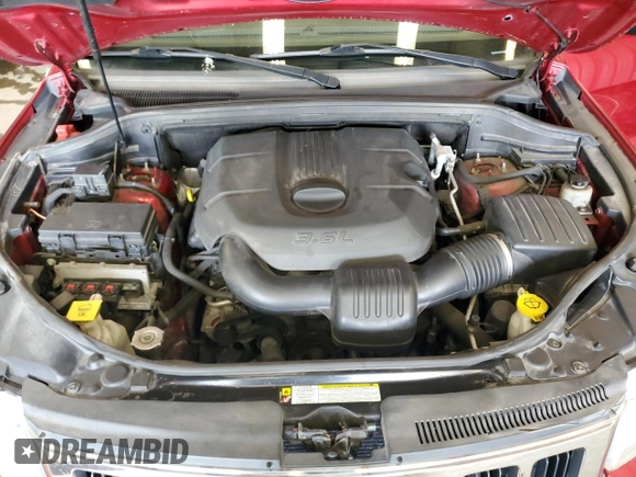 2011 Jeep Grand Cherokee Laredo with VIN 1J4RR4GG3BC669561, listed as a Copart auction lot 63627395 with 99,211 mi miles and Salvage title. Bid and sale history available at DreamBid. Image 12.