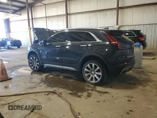 2023 Cadillac XT4 AWD Premium Luxury z VIN 1GYFZDR47PF209282, wystawiony jako Copart lot #51175635 z przebiegiem Nie podano mil oraz Szkoda całkowita • Salvage title. Historia ofert i sprzedaży dostępna na DreamBid. Obrazek 2.