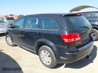 2014 Dodge Journey SE with VIN 3C4PDCAB5ET182776, listed as a IAAI auction lot 41703328 with 199,616 mi miles. Bid and sale history available at carsss.com. Image 3.