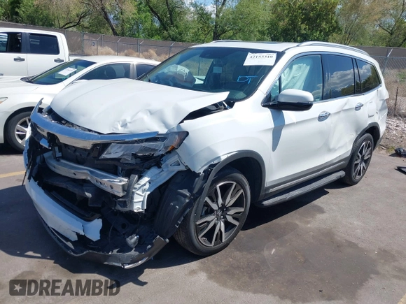 2021 Honda Pilot Touring 8-Passenger z VIN 5FNYF6H94MB087593, wystawiony jako IAAI lot #42153310 z przebiegiem 30 400 mil mil oraz . Historia ofert i sprzedaży dostępna na DreamBid. Obrazek 17.