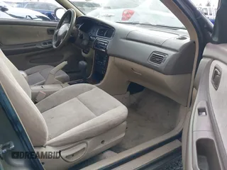 1999 Nissan Altima XE with VIN 1N4DL01D1XC210017, listed as a IAAI auction lot 41199544 with 297,917 mi miles. Bid and sale history available at carsss.com. Image 5.