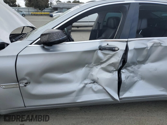 2013 BMW 7 Series 750i with VIN WBAYA8C57DC996498, listed as a Copart auction lot 52907415 with 109,405 mi miles and Salvage Title. Bid and sale history available at DreamBid. Image 7.