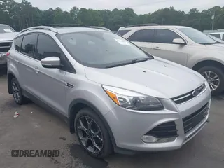 2013 Ford Escape Titanium with VIN 1FMCU9J9XDUB51442, listed as a IAAI auction lot 42640022 with 105,540 mi miles and . Bid and sale history available at DreamBid. Image 1.