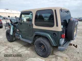 2002 Jeep Wrangler Sahara with VIN 1J4FA59S22P712913, listed as a Copart auction lot 43350115 with 86,320 mi miles and Salvage Title. Bid and sale history available at carsss.com. Image 2.