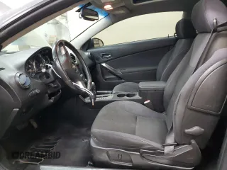 2009 Pontiac G6 GT 1SA z VIN 1G2ZH17NX94187538, wystawiony jako Copart lot #59767455 z przebiegiem 161 105 mil mil oraz Czysty tytuł • Clean title. Historia ofert i sprzedaży dostępna na DreamBid. Obrazek 7.