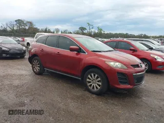 2011 Mazda CX-7 i SV with VIN JM3ER2A54B0359833, listed as a IAAI auction lot 41640336 with 140,302 mi miles. Bid and sale history available at carsss.com. Image 1.