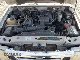 2010 Ford Ranger XL with VIN 1FTKR1AD4APA44985, listed as a Copart auction lot 59517295 with 57,541 mi miles and Salvage title. Bid and sale history available at DreamBid. Image 11.