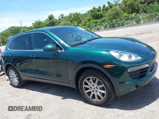 2014 Porsche Cayenne with VIN WP1AA2A21ELA06570, listed as a IAAI auction lot 42473298 with 61,421 mi miles and . Bid and sale history available at DreamBid. Image 14.