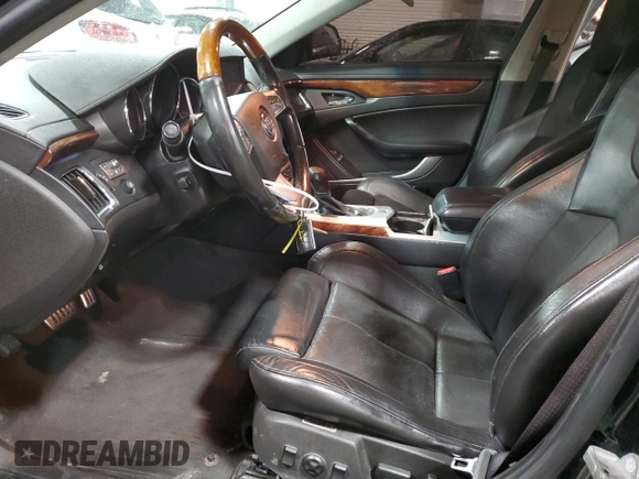 2010 Cadillac CTS with VIN 1G6DM5EV1A0143597, listed as a Copart auction lot 75373103 with 123,731 mi miles and Salvage Title. Bid and sale history available at DreamBid. Image 7.
