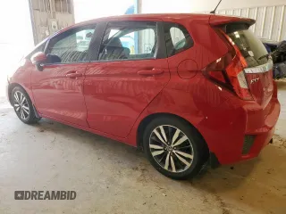 2015 Honda Fit EX-L z VIN 3HGGK5H88FM701702, wystawiony jako Copart lot #56390935 z przebiegiem 111 410 mil mil oraz Szkoda całkowita • Salvage title. Historia ofert i sprzedaży dostępna na DreamBid. Obrazek 2.