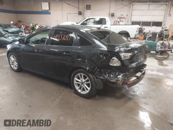 2015 Ford Focus SE with VIN 1FADP3F24FL285287, listed as a IAAI auction lot 41937687 with 130,460 mi miles. Bid and sale history available at carsss.com. Image 3.