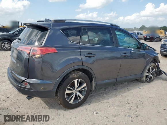 2018 Toyota RAV4 XLE with VIN 2T3WFREV2JW409292, listed as a Copart auction lot 61577355 with 189,258 mi miles and Salvage title. Bid and sale history available at DreamBid. Image 3.