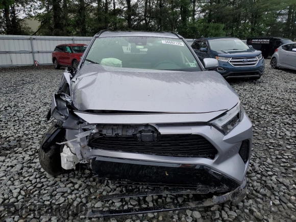 2023 Toyota RAV4 Hybrid SE with VIN JTM16RFV7PD100111, listed as a Copart auction lot 56682135 with 32,198 mi miles and Salvage title. Bid and sale history available at DreamBid. Image 5.