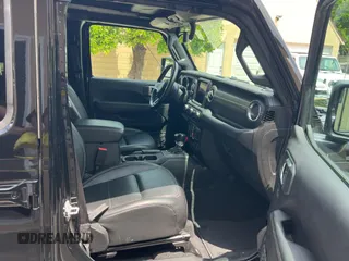 2023 Jeep Wrangler Sahara with VIN 1C4JJXP65PW627241, listed as a Copart auction lot 55661585 with 9,282 mi miles and Clean Title. Bid and sale history available at DreamBid. Image 5.